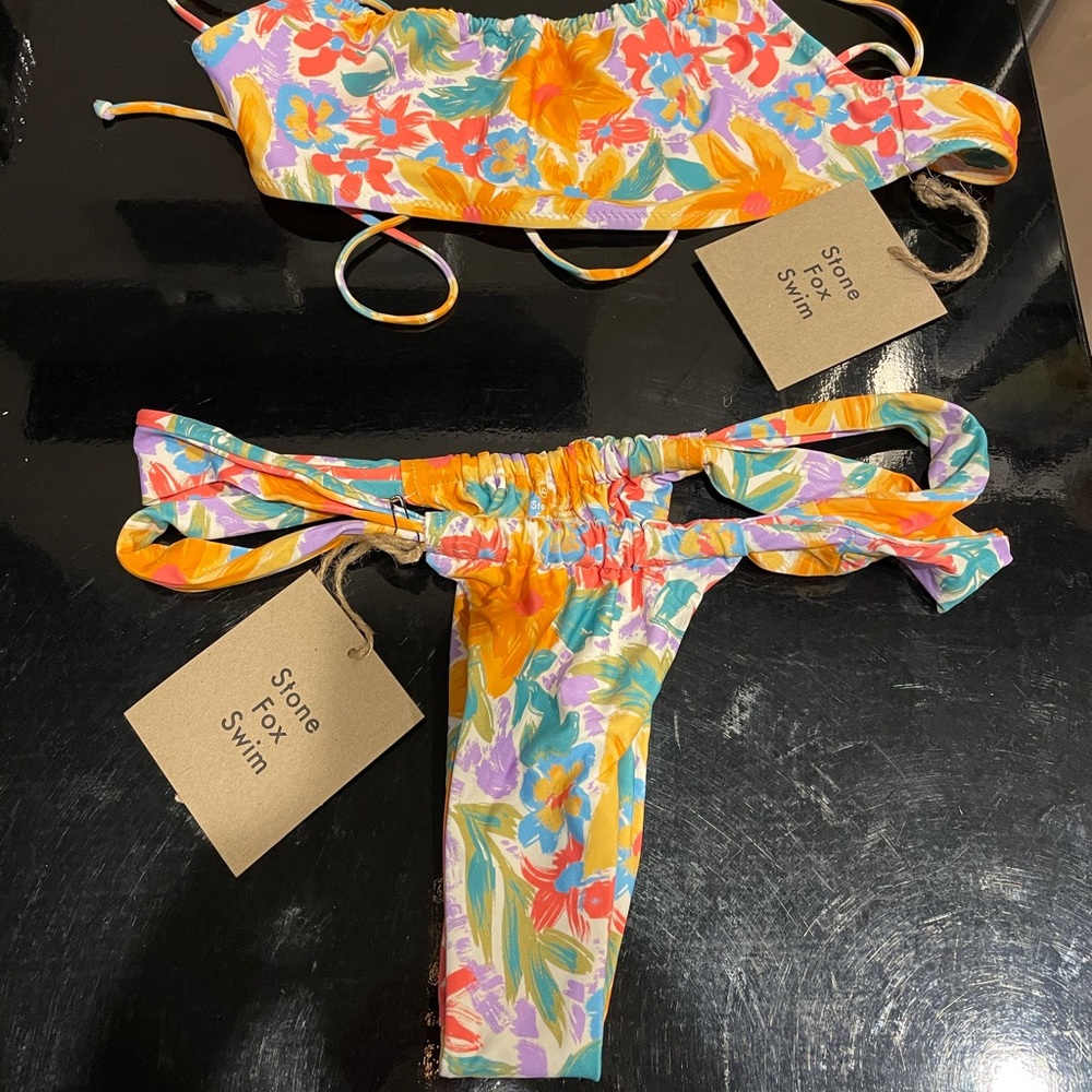 Stone fox swimwear. Size med bottoms size lrg top